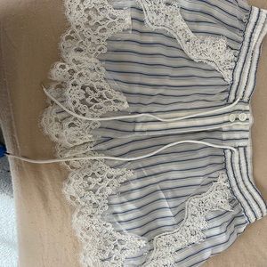 Sacai pinstripe shorts with lace inserts Size 4 which is XL